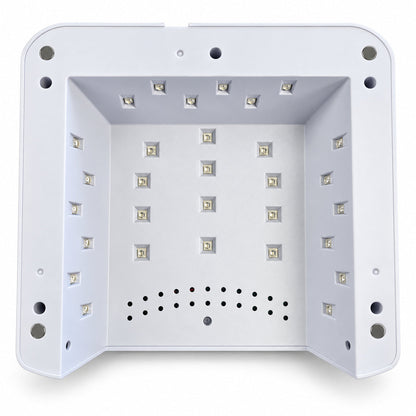 Interiorul alb al lămpii UV LED pentru unghii BQ L17, cu 30 de LED-uri amplasate pe plafon și pe pereții laterali, orificii de ventilație și zona de polimerizare văzută de dedesubt.